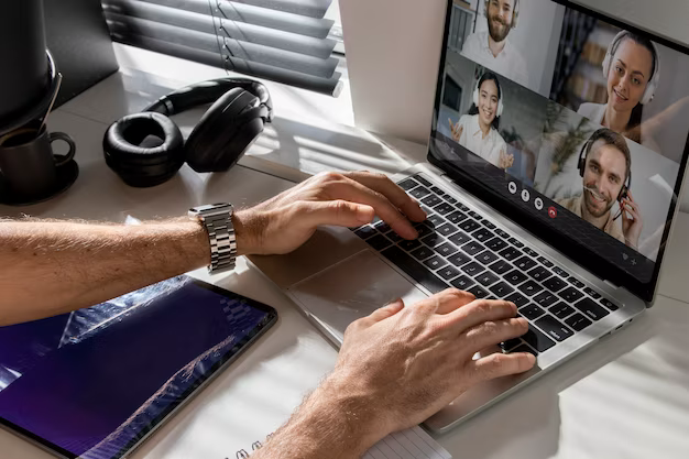 Close up on laptop screen with virtual meeting