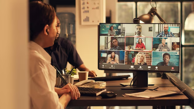 Girl talking to colleagues via video call